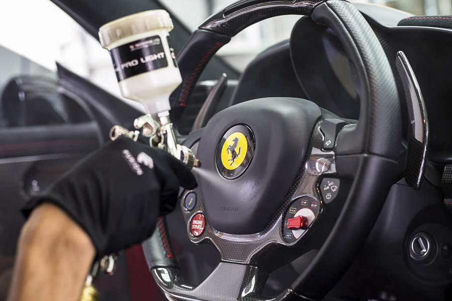 Spraying Ceramic Pro Ferrari Interior